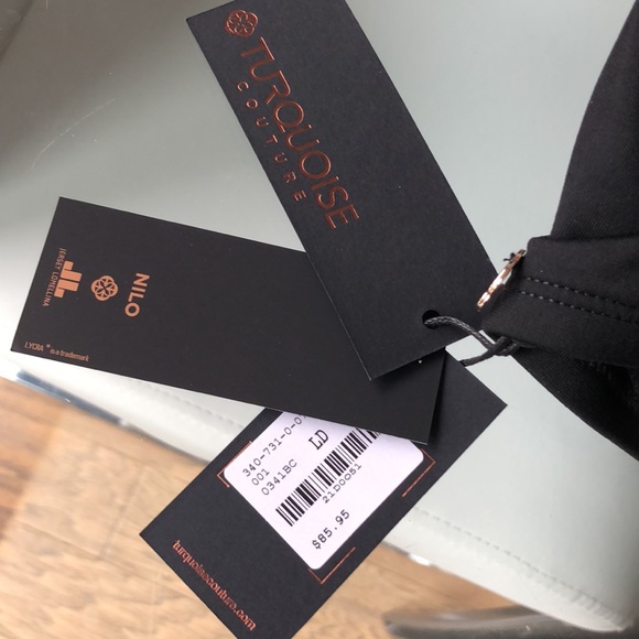 Black bikini top with white trim. - Picture 4 of 4